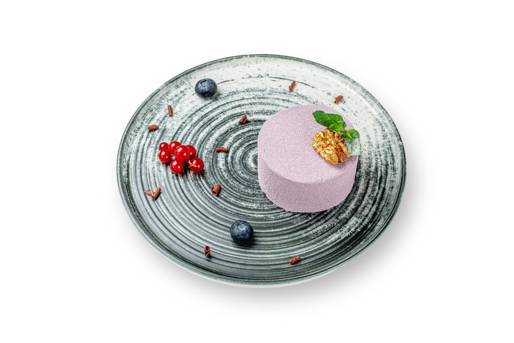 Stack of plated dishes prepared for tasting